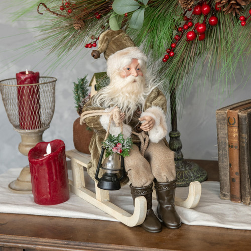 SANTA ON SLED W/ OLIVE GREEN COAT