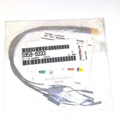 HP 5959-9333 Data Clock Pods with tips, cable, probes, labels for testing and diagnostics in electronic work.