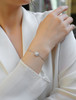 Paper Short, Long Affection - Made of morganite, 925 sterling silver and platinum-plated diamonds, it is a fashionable jewelry bracelet and a luxurious silver accessory.