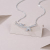 A fashionable and popular jewelry necklace pendant set, featuring Monnes stone, made of 925 silver and plated with platinum diamonds.