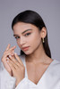 A fashionable and popular jewelry necklace pendant set, featuring Monnes stone, made of 925 silver and plated with platinum diamonds