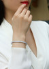 Cosmic Trajectory - Made of morganite, 925 sterling silver and platinum-plated diamonds, it is a fashionable jewelry bracelet and a luxurious silver accessory.