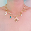 Angel & Rose Charm Necklace – Bold Gold Chain with Whimsical Vintage-Inspired Accents