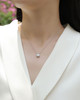 A fashionable and trendy jewelry necklace pendant set, featuring 1 carat moissanite gemstones, made of 925 silver material.