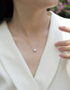 A fashionable and trendy jewelry necklace pendant set, featuring 1 carat moissanite gemstones, made of 925 silver material.