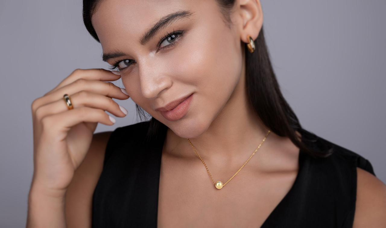 Good Fortune Flows - A fashionable and trendy jewelry necklace pendant set with 0.1-carat Moissan diamond S925 sterling silver and gold-plated