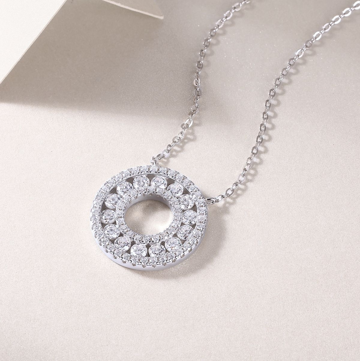 Revolv - A fashionable and popular jewelry necklace pendant set, featuring Monnes stone, made of 925 silver and plated with platinum and diamonds.