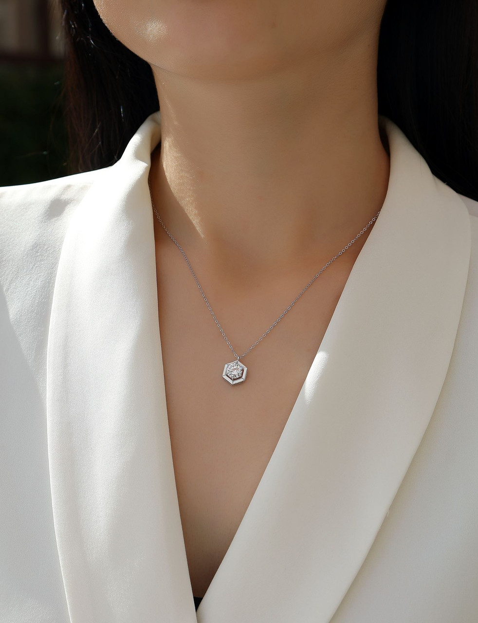 A fraction of it - a fashionable and popular jewelry necklace pendant set, featuring Monis stone, made of 925 silver and plated with platinum diamonds.