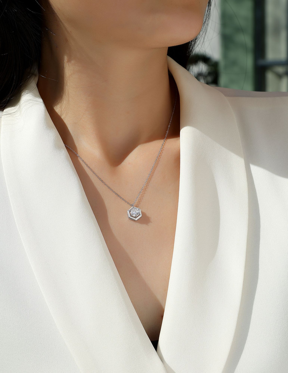 A fraction of it - a fashionable and popular jewelry necklace pendant set, featuring Monis stone, made of 925 silver and plated with platinum diamonds.