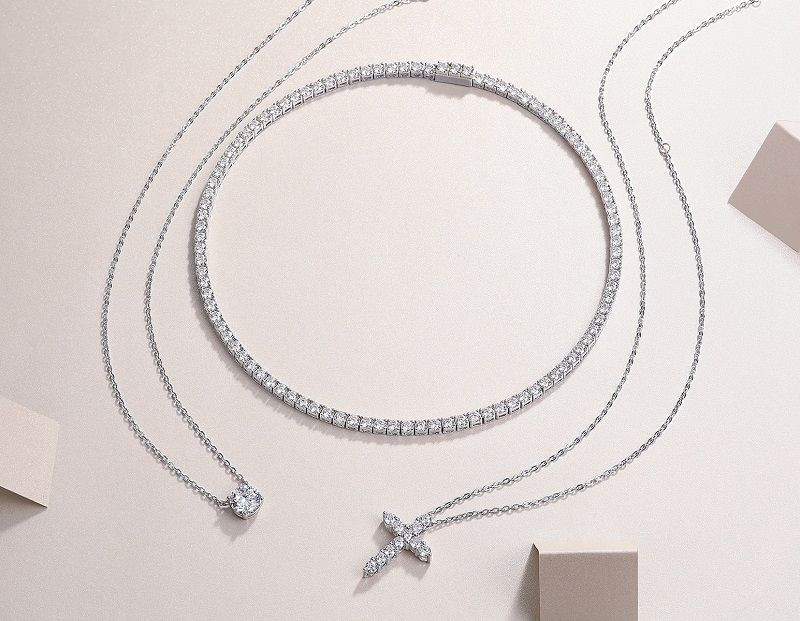 The Radiant Cross Circle - A fashionable and popular jewelry necklace pendant set, featuring Monnes stone, made of 925 silver and plated with platinum diamonds.