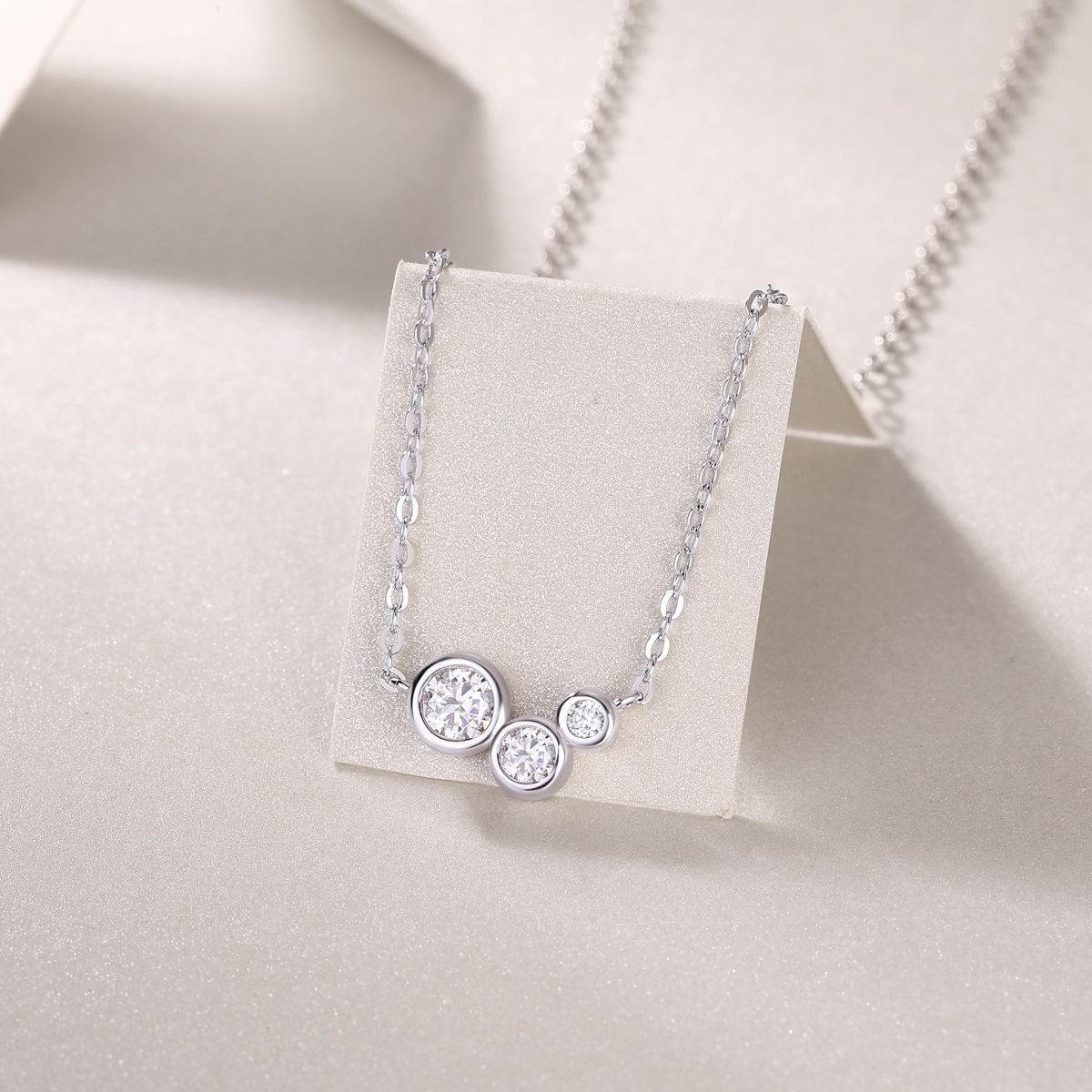A fashionable and popular jewelry necklace pendant set, featuring Monisite gemstones, made of 925 silver and plated with platinum and diamonds.