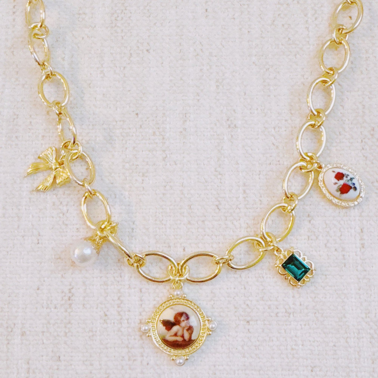 Angel & Rose Charm Necklace – Bold Gold Chain with Whimsical Vintage-Inspired Accents