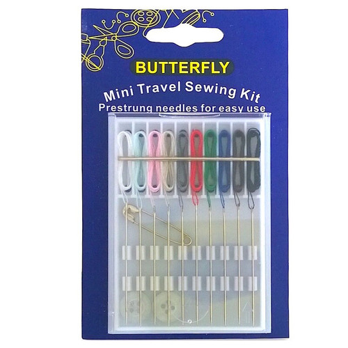 A mini credit card sized travel sewing kit. The kit contains 10 pre threaded needles with cottons in white, pale blue, pale pink, cream, grey, red, bottle green, royal blue, brown and black and other sewing kit essentials