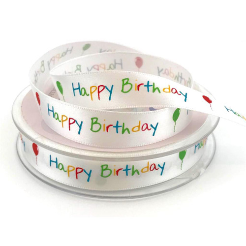 White satin ribbon with multicoloured “Happy Birthday” text and colourful balloon prints. Printed on one side. Ribbon width is 16mm. Image shows ribbon round wound a spool.