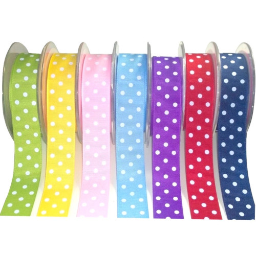 Close-up of 25mm grosgrain ribbon with four rows of small white polka dots on a ribbed texture, showing you seven colours of polka dot ribbon in this image.