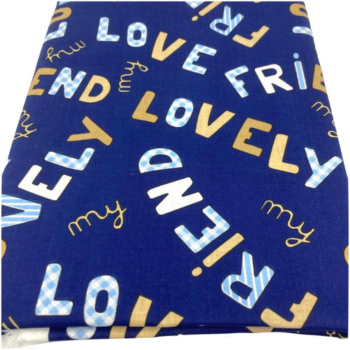 Image shows a lightweight navy cotton fabric with words including “lovely,” “friend,” and “my love” printed in a repeating pattern. The fabric is 137cm wide, soft to the touch, and has a smooth finish with gentle drape. Image shows fabric folded into a rectangle.