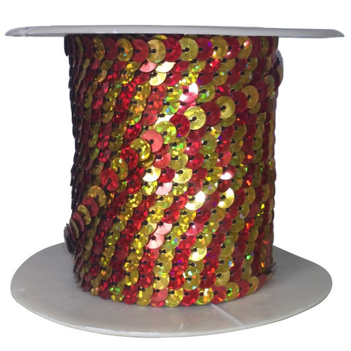 Alternating red and gold hologram sequins each 6mm diameter, pre-strung on thread, shown on a roll.