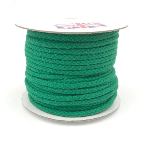 A roll of green strong 4mm braided cotton lacing cord, natural finish, shown coiled neatly on a 30 meter roll.