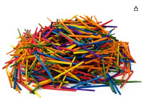 A large pile of brightly coloured headless craft matchsticks in assorted colours, shown loose on a white background.”