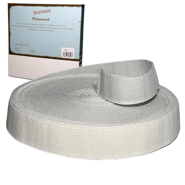 A roll of white stretch petersham tape with a blue card in the background stating Nortexx peterstretch especially for trouser and skirt waistlines
