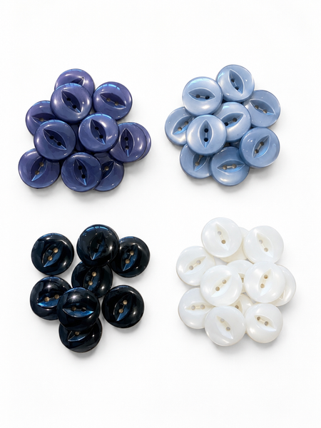 Fisheye Buttons. Featuring a distinctive raised fisheye design and a secure shank back, these durable plastic buttons are ideal for garments, knitwear, coats, cardigans, children's clothing, accessories, and a wide range of craft projects.
Available in a selection of classic colours including Cream, Navy, Black, Light Blue, and White, these buttons offer a smooth, glossy finish that complements both modern and traditional designs