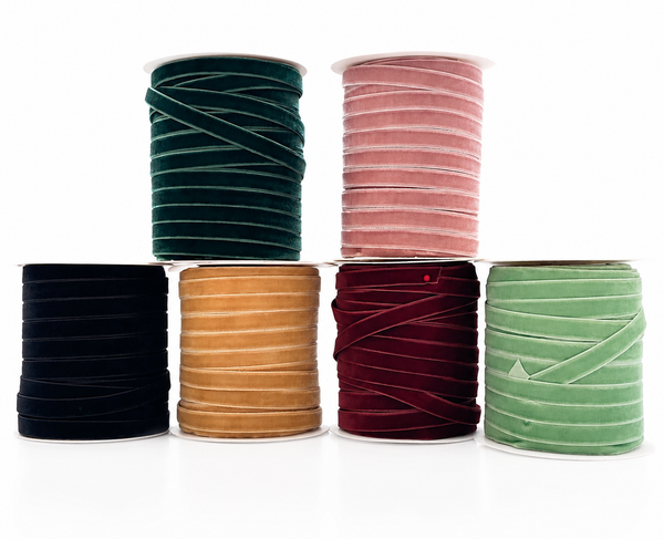 Selection of luxury 10mm velvet ribbons sold by the metre in six colours: black, burgundy, hunter green, dusty rose, gold and sage for sewing, crafts and gift wrapping.