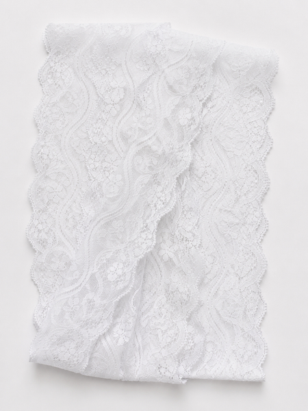 White 80mm scalloped stretch lace trim sold by the metre. Ideal for dressmaking, lingerie, bridal wear, sewing, crafts and decorative edging.