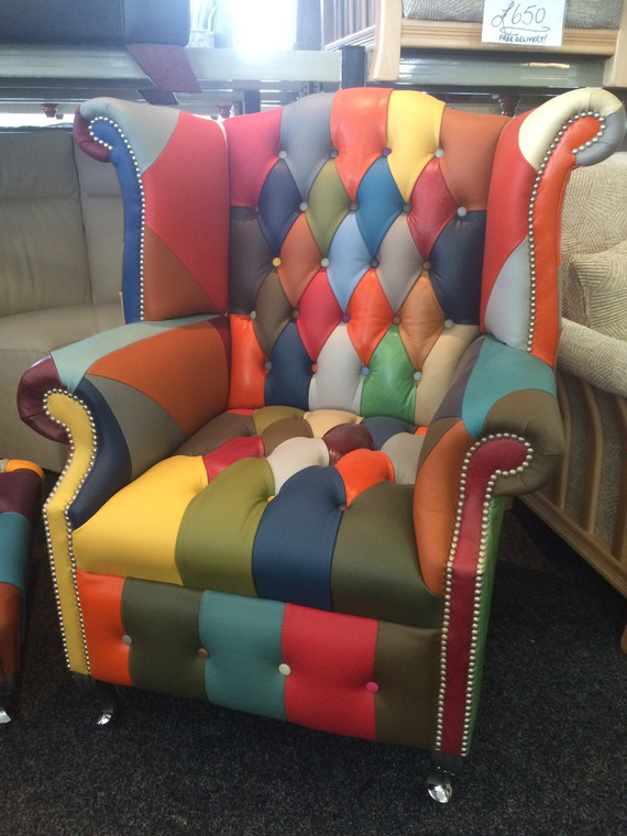 Multi-coloured leather with chrome legs.
Single button facia.