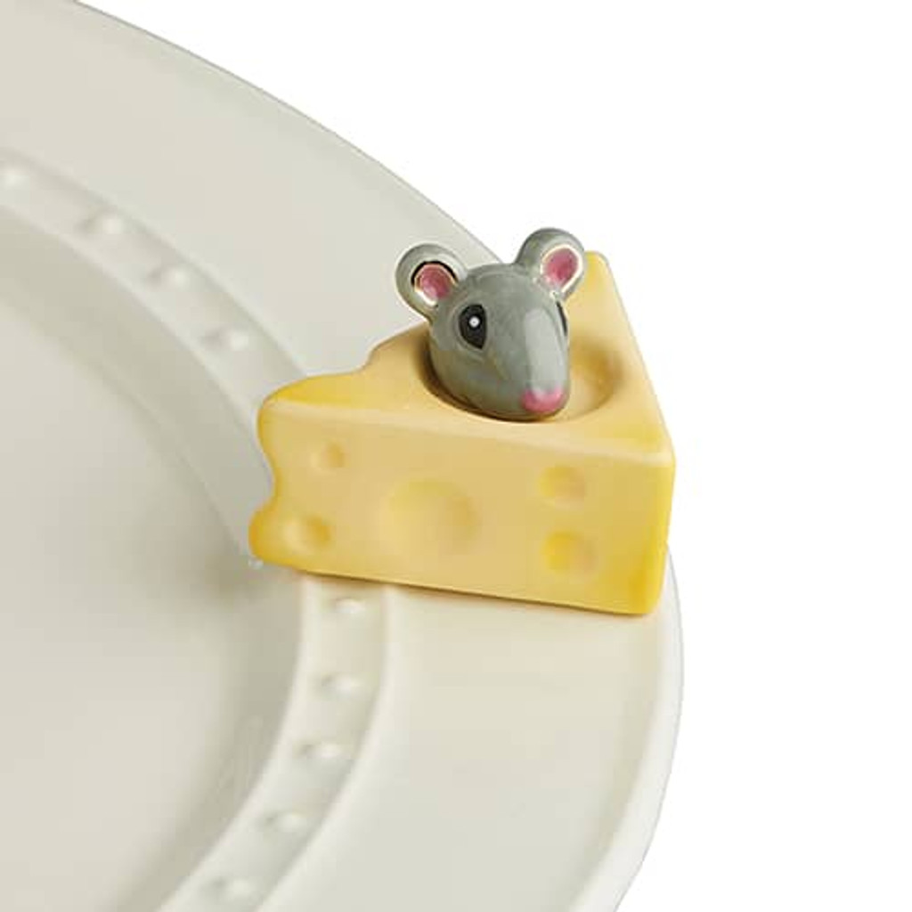 Nora Fleming, cheese, please! A223
The long awaited cheese mini, accompanied by a tiny friend. your cheese board is now complete!
Not dishwasher safe.  Hand wash only.
