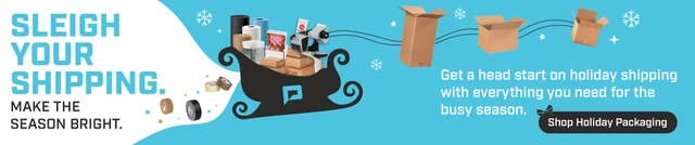 Holiday shipping supplies with sleigh graphic and packaging products.