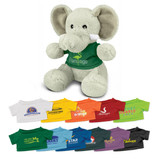 A grey elephant plush toy wearing a green shirt with a logo, displayed alongside various coloured shirts.