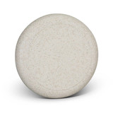 A round, speckled light grey frisbee featuring a smooth surface and no visible branding or text.