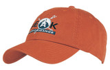 An orange cap with a rounded brim and a logo on the front. It features stitching details and is made from twill fabric.