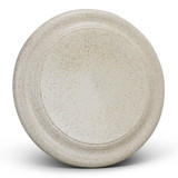 A large, speckled beige plate with a smooth surface and a raised edge, featuring a subtle logo.