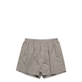 Striped boxer shorts featuring an elastic waistband and a loose fit. The fabric has a light colour palette.