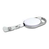 A retractable ID holder featuring a circular design with a white surface and a metal clip for attachment. A retractable ID holder featuring a circular design with a white surface and a metal clip for attachment.