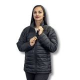 A puffer jacket in black worn by a model, featuring a high collar and zip closure. It has a logo on the chest. A puffer jacket in black worn by a model, featuring a high collar and zip closure. It has a logo on the chest.