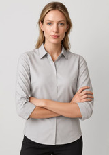 A light grey women's button-up shirt with 3/4 sleeves, featuring a collar and a fitted design.