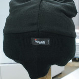 Acrylic beanie in black with a Thinsulate lining tag, featuring a snug, soft design.