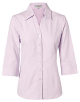 A lilac button-up shirt featuring a collar and 3/4 sleeves, with a logo on the label.
