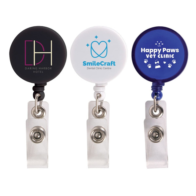 A set of three retractable name badge holders in black, white, and blue, each featuring different logos. A set of three retractable name badge holders in black, white, and blue, each featuring different logos.