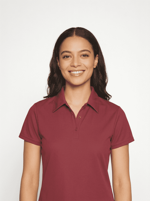 A burgundy polo shirt worn by a woman with long hair, featuring a collar and a subtle logo.
