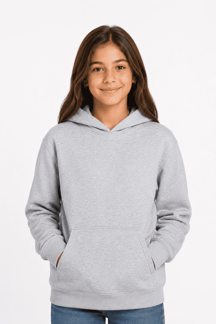 A grey hoodie for kids with a front pocket and a large hood. The garment has a plain design and features branding.