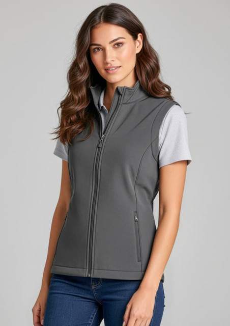 A women's grey vest with a zip front and side pockets, featuring a fitted style and a logo.