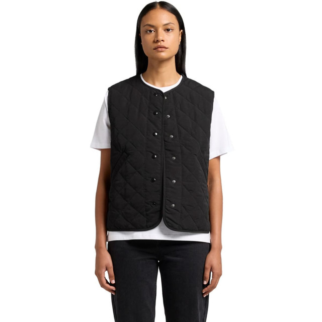 A black quilted vest with a button front, featuring a round neckline and a logo. Worn over a white T-shirt.