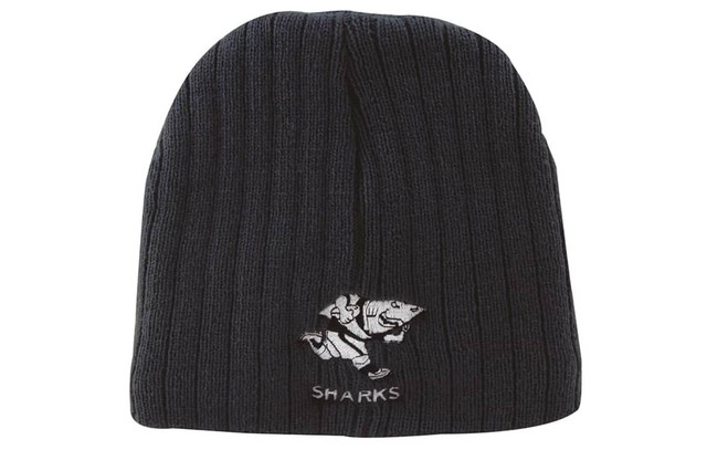 A black cable knit beanie with an embroidered logo featuring a running shark design and text.
