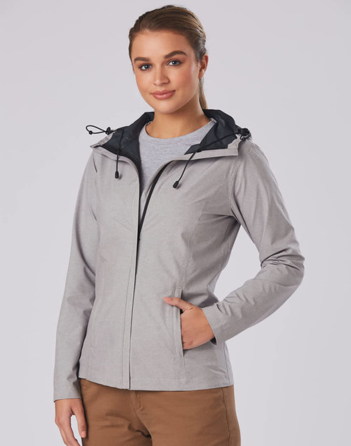 A waterproof performance jacket in light grey with a black hood and adjustable features. It has a subtle logo.