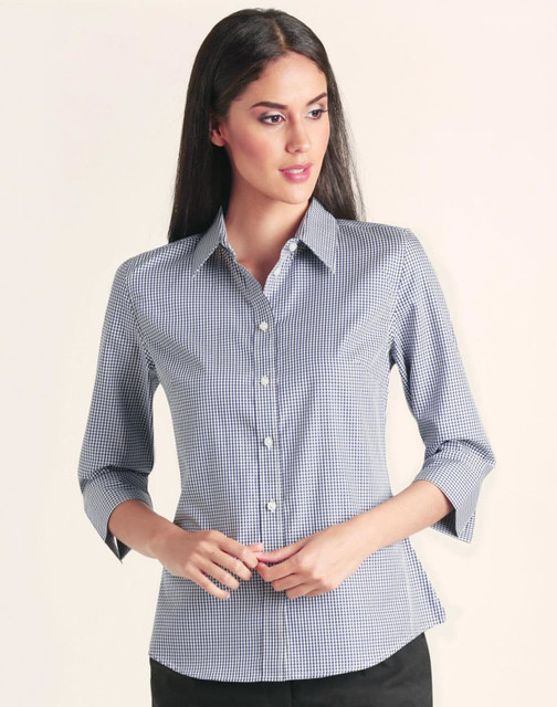 A women’s button-up shirt featuring a two-tone check pattern in navy and white, with 3/4 sleeves and a collar.