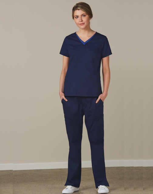 Navy solid colour scrub pants paired with a navy scrub top, featuring a simple design and pockets. Navy solid colour scrub pants paired with a navy scrub top, featuring a simple design and pockets.