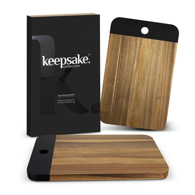A wooden serving board with a black handle, presented with sleek packaging featuring a logo. A wooden serving board with a black handle, presented with sleek packaging featuring a logo.